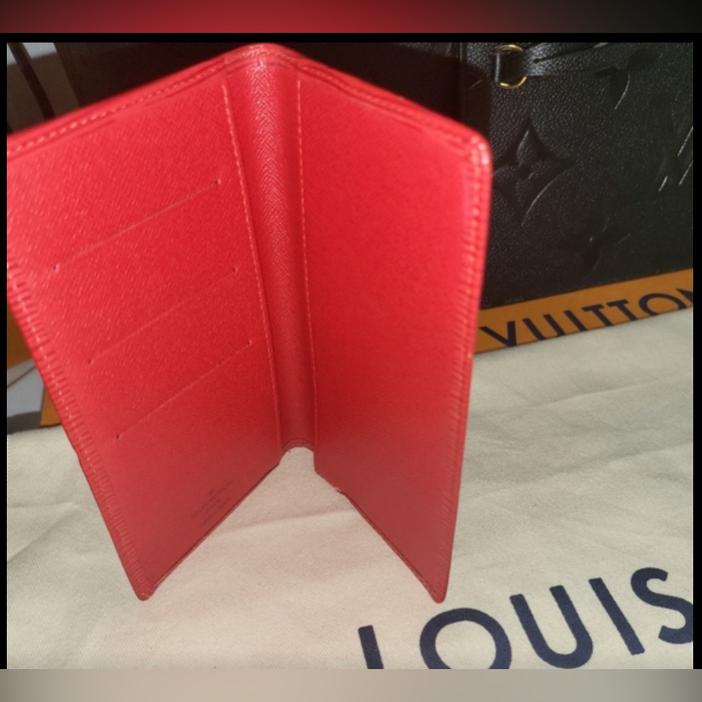 LOUIS VUITTON INTERNATIONAL EPI LEATHER PASSPORT COVER 
With credit card space .